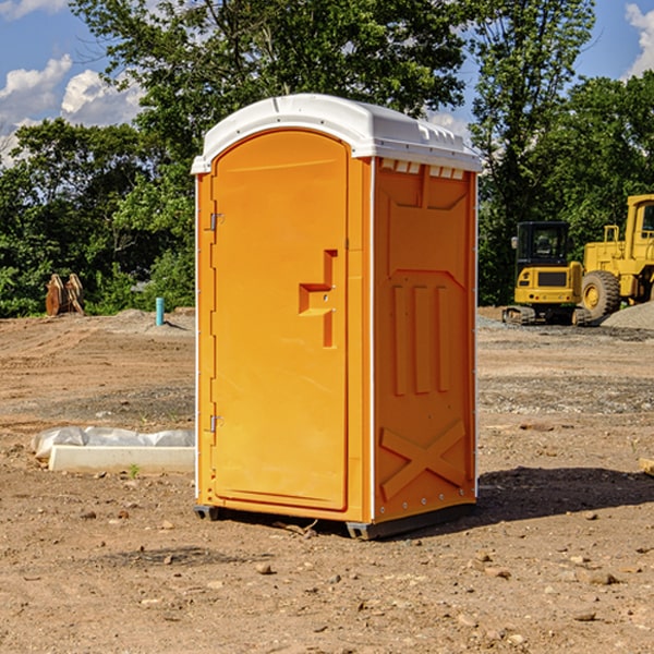 how often are the portable restrooms cleaned and serviced during a rental period in Polk City IA